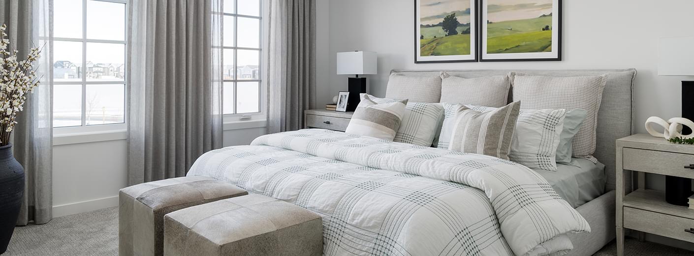 Beautifully staged bedroom in a Baywest show home